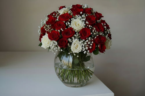 Bouquet of red and white roses in a Clear Vase with A Touch of Love'